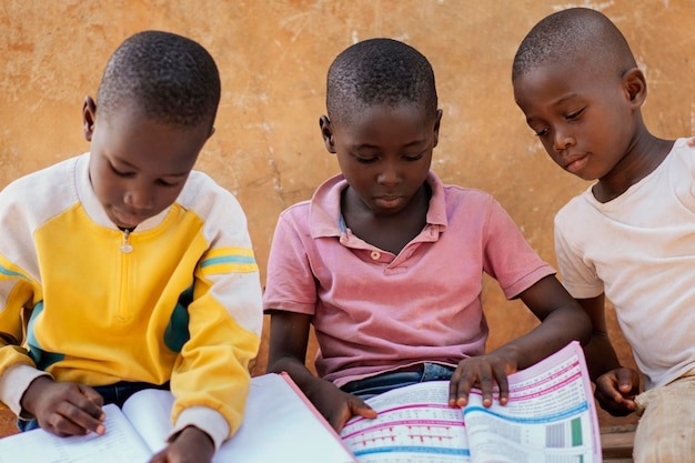 african kids reading together