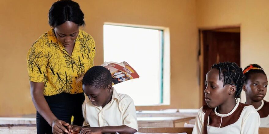 Woman teaching a child